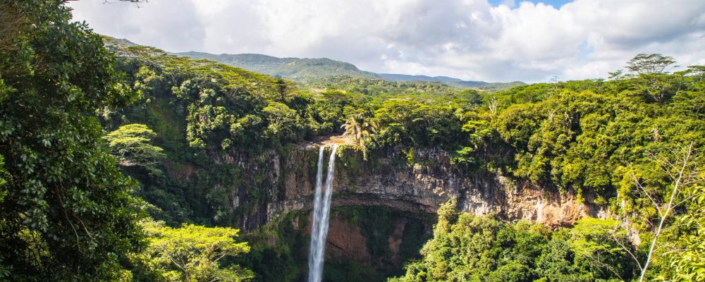 A beautiful scenery of Chamarel Waterfall in Mauritius under a cloudy sky